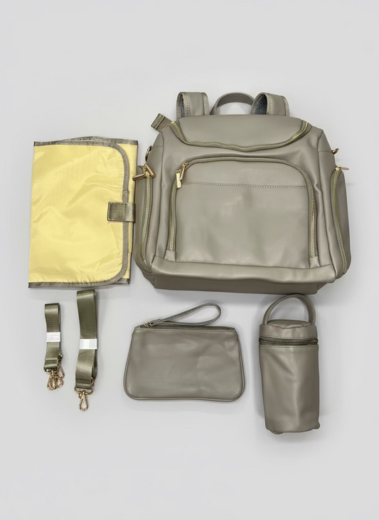 Pañalera morral con accesorios tipo cuero